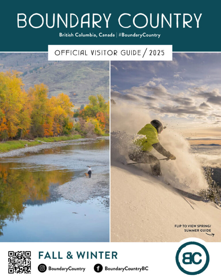 Split cover of the Boundary Country Visitor Guide 2025 showing fall trees by a river on the left and a snowboarder riding through fresh winter snow on the right. Social media links and guide info appear at the bottom.